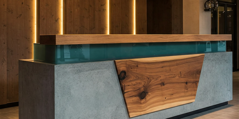 Hotel reception desk combining resin and wood