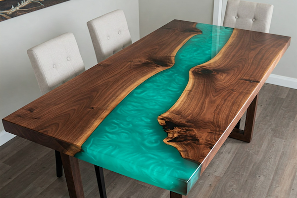 Turquoise epoxy resin river table with walnut wood